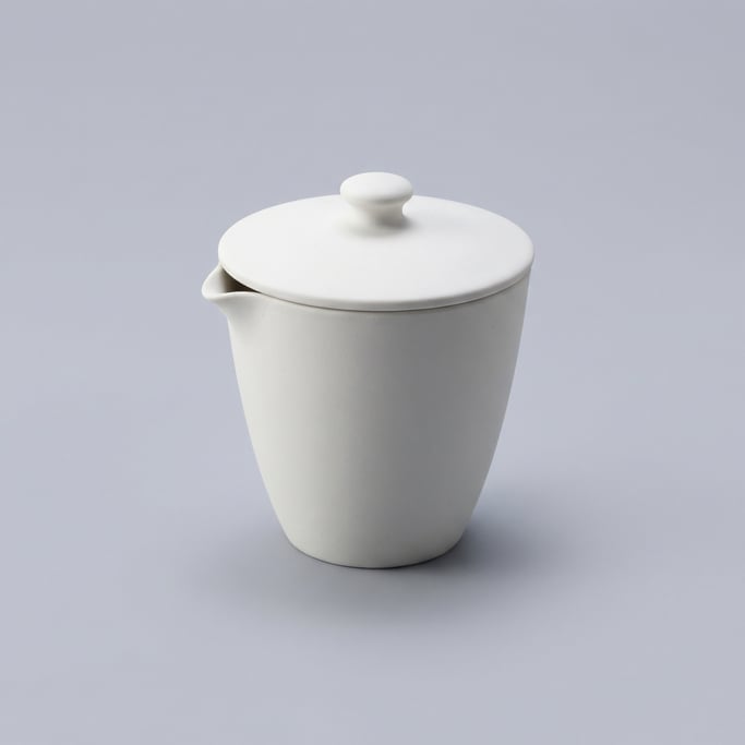 Porcelain crucible in unglazed white ceramic with a conical body, a shallow pouring lip