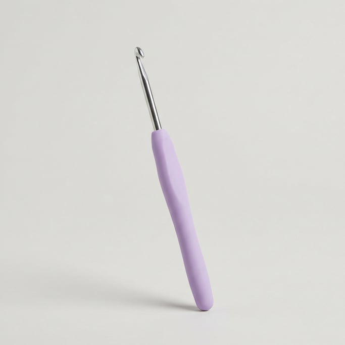 Steel crochet hook with an ergonomic cushioned soft-grip handle in lavender silicone and a polished