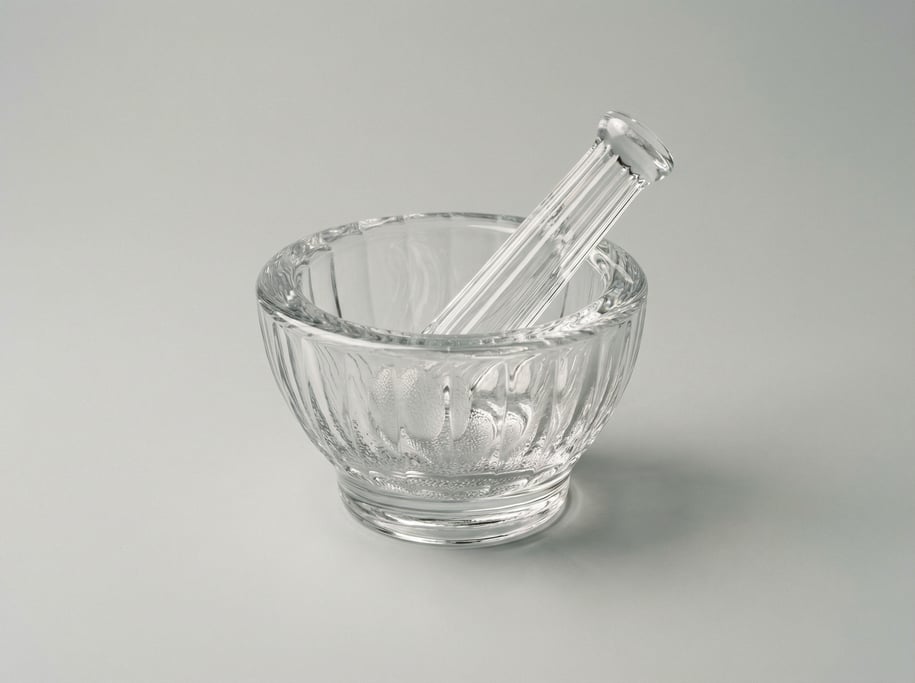 Glass apothecary mortar in thick clear crystal with a matching ribbed pestle and a wide stable grind