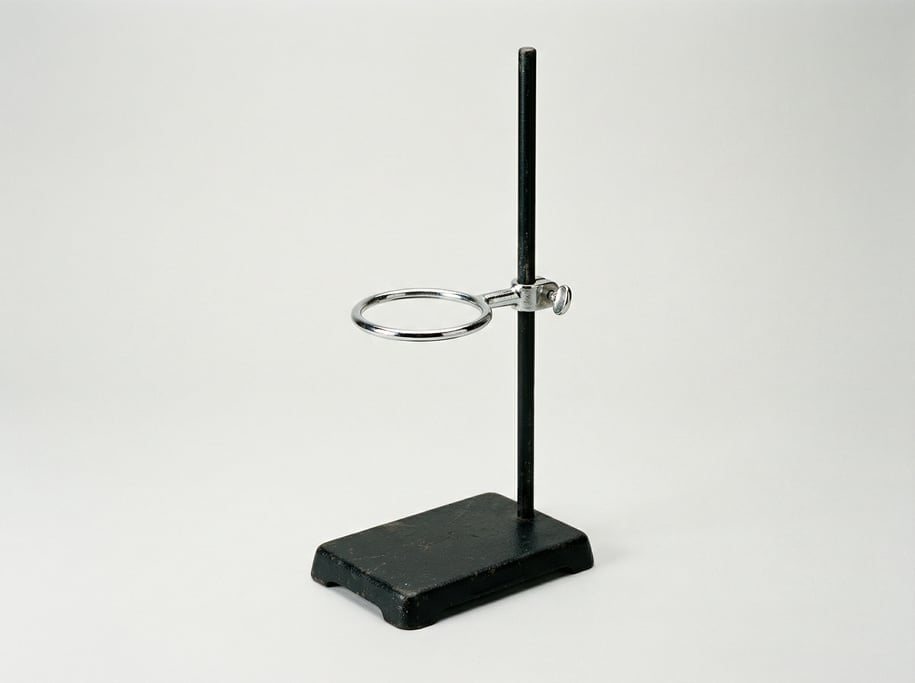 Laboratory ring stand in black painted cast iron with a heavy base, vertical support rod
