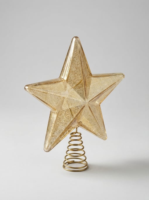 Glass tree topper star ornament in translucent gold with faceted edges, internal glitter