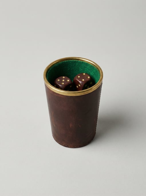 Leather backgammon dice cup in dark brown with interior felt lining, brass rim reinforcement