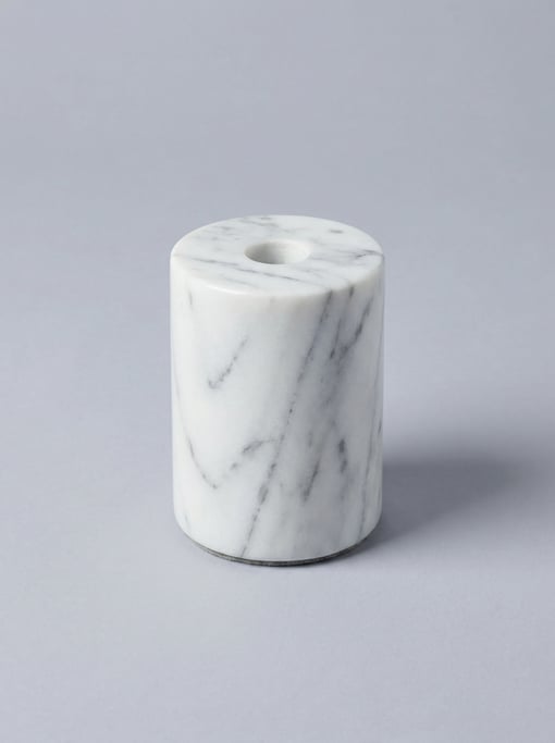 Marble pen holder in white Carrara with grey veining, a single drilled hole, a polished surface