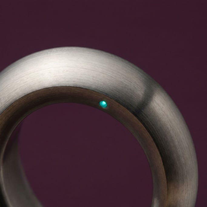 Titanium smart ring with a subtle embedded LED indicator