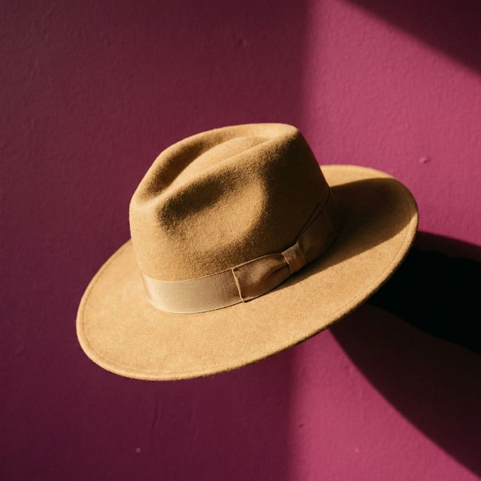 Wide-brim felt fedora in camel with a grosgrain ribbon band