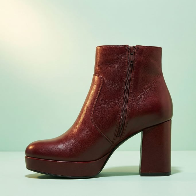 Platform leather ankle boot in rich oxblood with a chunky block heel and side zip