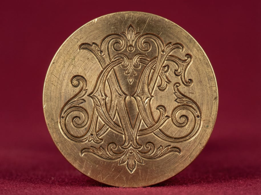Brass wax seal stamp with an ornate monogram letter