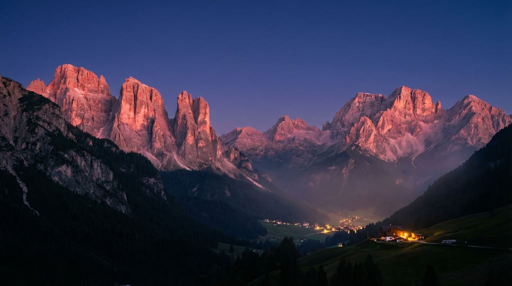 Dolomite towers glowing pink in alpenglow, vertical limestone pillars against a deep twilight sky (ph5xxvn)