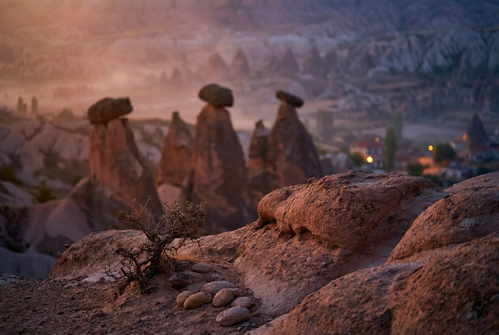 Fairy chimneys in Cappadocia, erosion-carved stone towers with balanced cap rocks