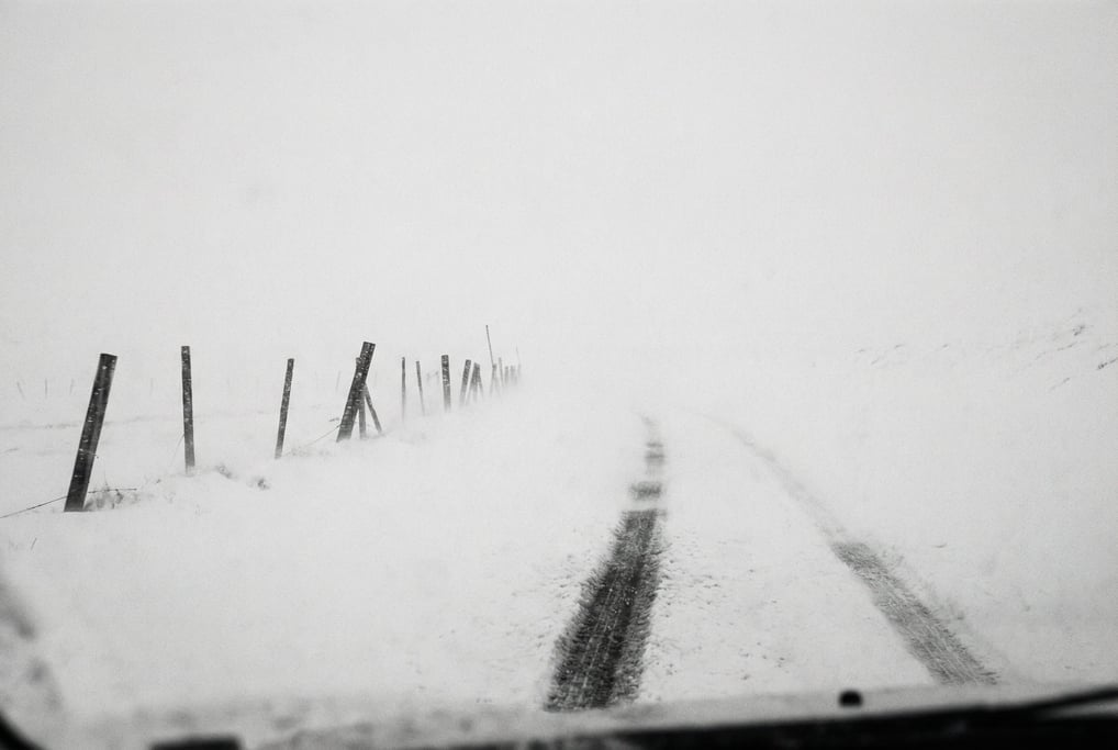 A mountain pass in a snowstorm
