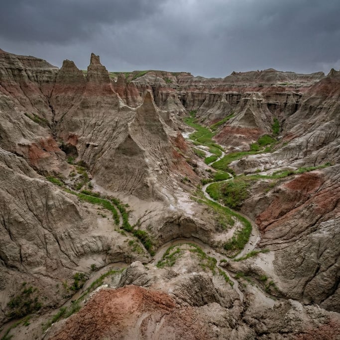 A sandstone badlands landscape after rain