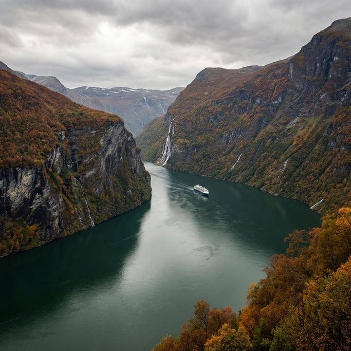Geirangerfjord in Norway from a high viewpoint on a cloudy autumn day