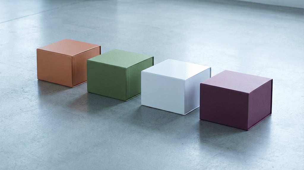 Magnetic closure box, diagonal row of four boxes, each a different color — matte copper