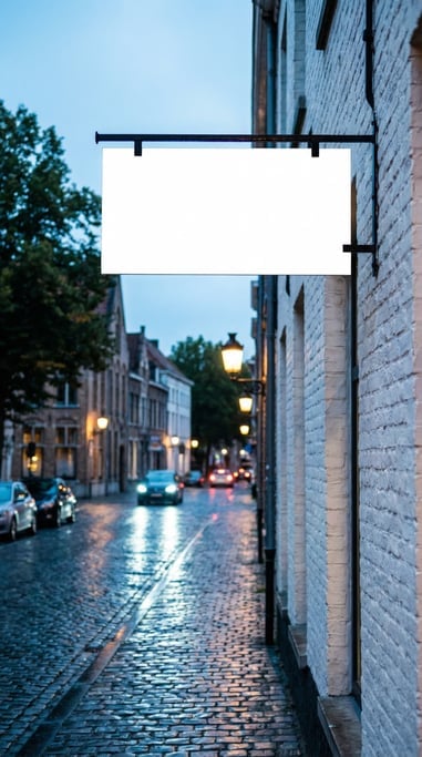 Rectangular hanging sign mounted on a white brick wall