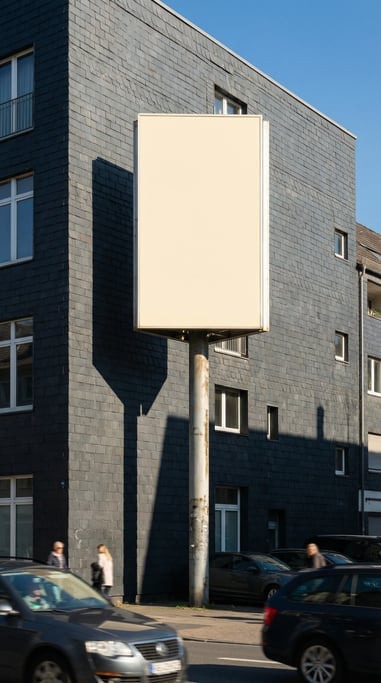 Pylon sign on a tall pole on a dark slate building exterior