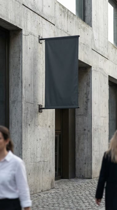 Flag banner on a building mounted on raw concrete wall