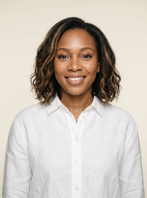 Professional studio headshot of a 35-year-old Nigerian woman with a textured lob with balayage highl