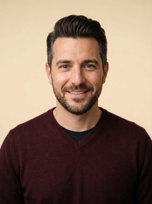 Professional studio headshot of a 40-year-old White Mediterranean man with a pompadour in dark brown