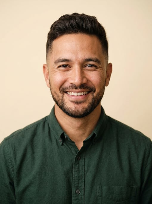 Professional studio headshot of a 36-year-old Hawaiian man with a French crop in dark brown