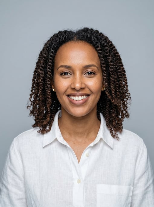 Professional studio headshot of a 35-year-old Somali woman with twist-outs in dark brown