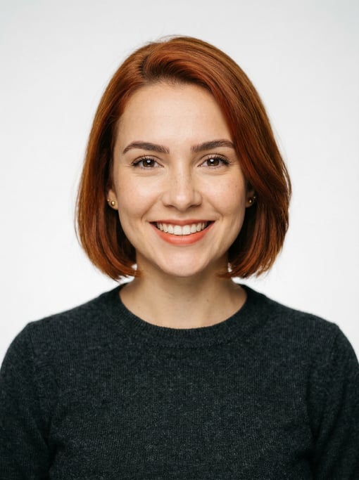 Professional studio headshot of a 25-year-old Brazilian woman with a chin-length bob in auburn