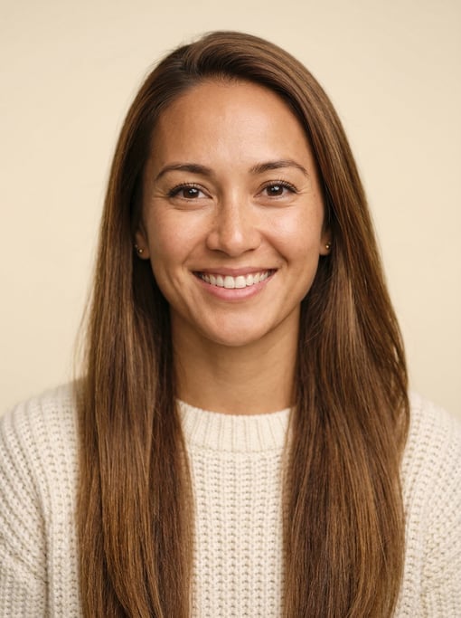 Professional studio headshot of a 30-year-old Hawaiian woman with long straight chestnut hair