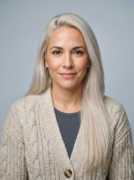 Professional studio headshot of a 39-year-old Puerto Rican woman with long straight platinum blonde