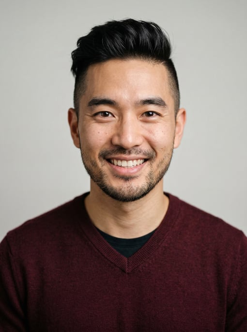 Professional studio headshot of a 33-year-old Korean man with an undercut with longer textured top
