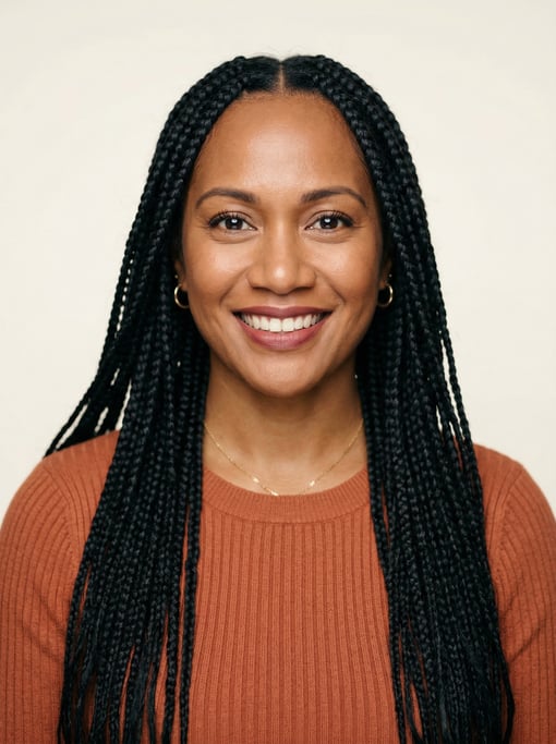 Professional studio headshot of a 38-year-old Polynesian woman with long box braids in black