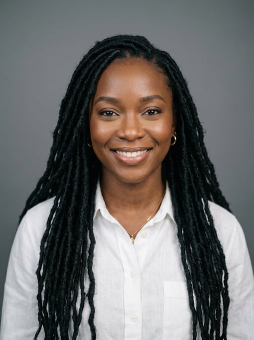 Professional studio headshot of a 28-year-old Black African woman with long faux locs in black