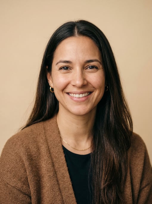 Professional studio headshot of a 33-year-old Cuban woman with long straight dark brown hair with a