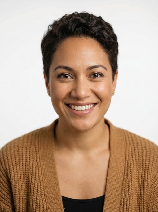 Professional studio headshot of a 33-year-old Polynesian woman with a tapered natural cut in dark br