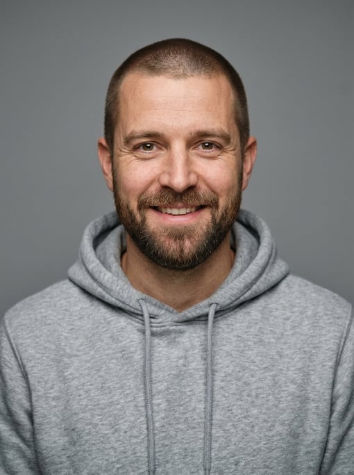 Professional studio headshot of a 39-year-old White European man with a buzz cut in brown