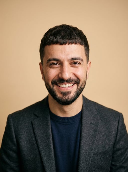 Professional studio headshot of a 33-year-old Turkish man with a French crop in dark brown