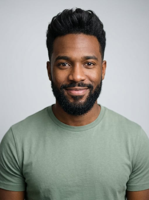 Professional studio headshot of a 27-year-old Black Caribbean man with a quiff in black