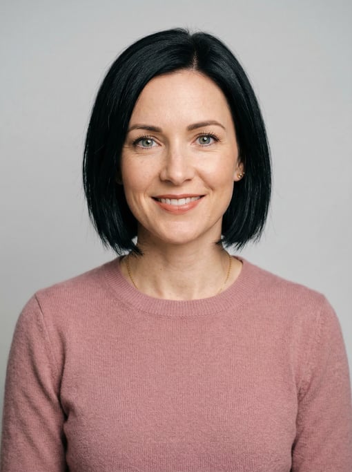 Professional studio headshot of a 35-year-old White European woman with a chin-length bob in jet bla