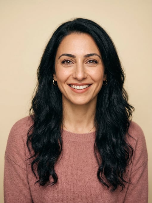 Professional studio headshot of a 38-year-old Lebanese woman with long wavy black hair