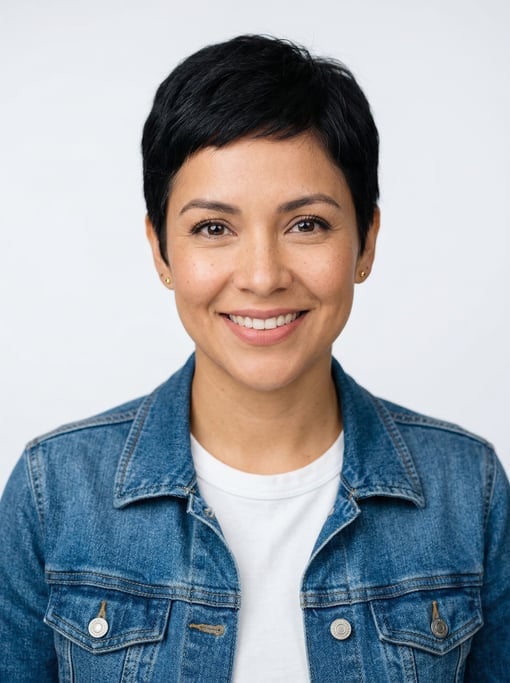 Professional studio headshot of a 33-year-old Latina woman with a short pixie cut in black