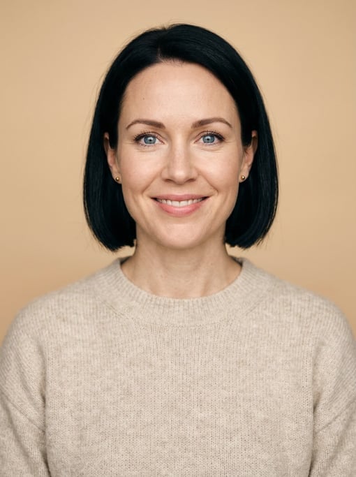 Professional studio headshot of a 36-year-old White Nordic woman with a chin-length bob in jet black