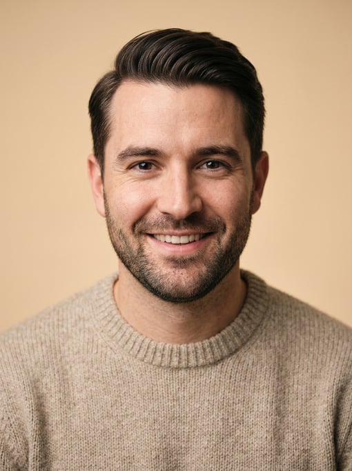 Professional studio headshot of a 31-year-old White European man with neat dark brown side-parted ha