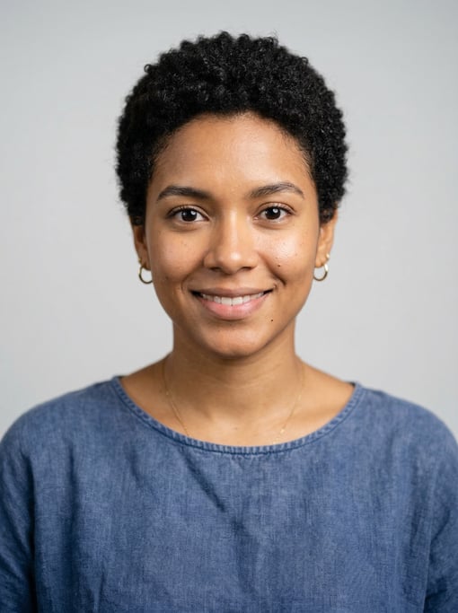 Professional studio headshot of a 24-year-old Colombian woman with a short TWA hairstyle in black