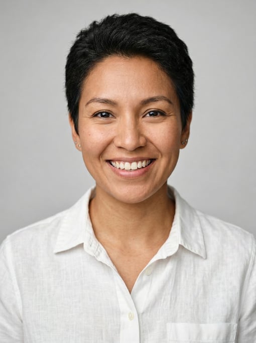 Professional studio headshot of a 30-year-old Native American woman with a short TWA hairstyle in bl