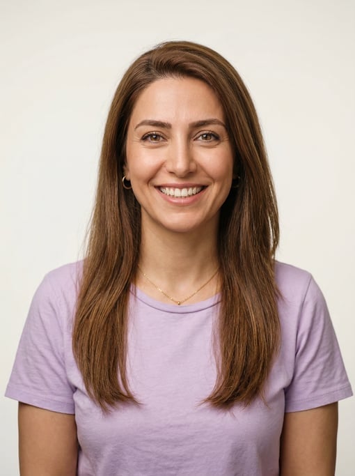 Professional studio headshot of a 35-year-old Persian woman with long straight chestnut hair
