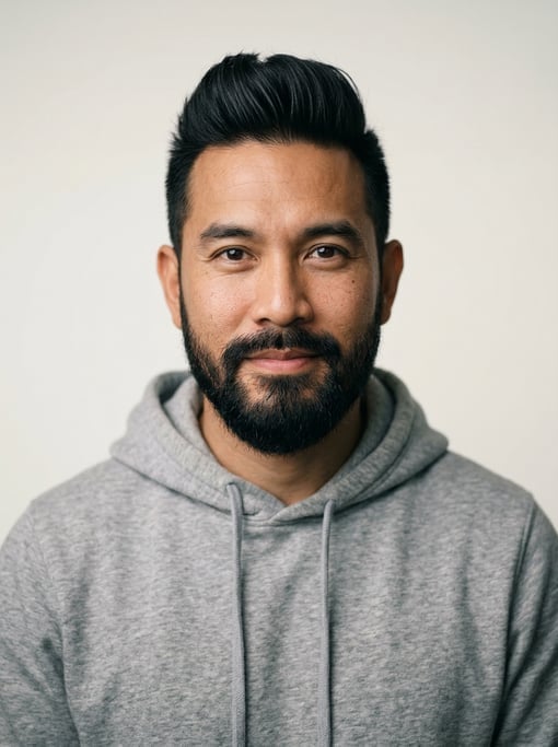 Professional studio headshot of a 39-year-old Thai man with a quiff in black