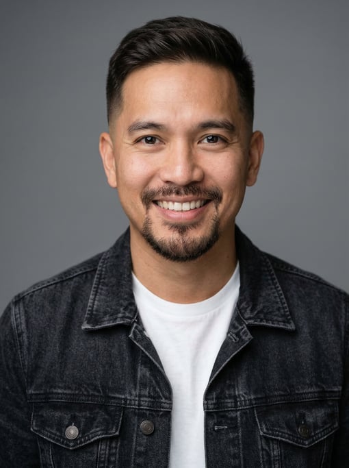 Professional studio headshot of a 39-year-old Filipino man with a taper fade in dark brown