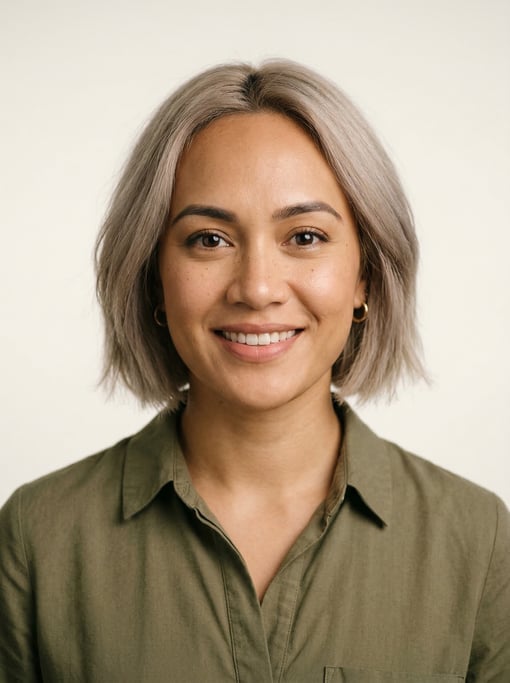 Professional studio headshot of a 28-year-old Polynesian woman with a chin-length bob in ash blonde