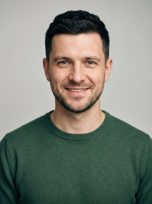 Professional studio headshot of a 31-year-old White Eastern European man with a black textured crop