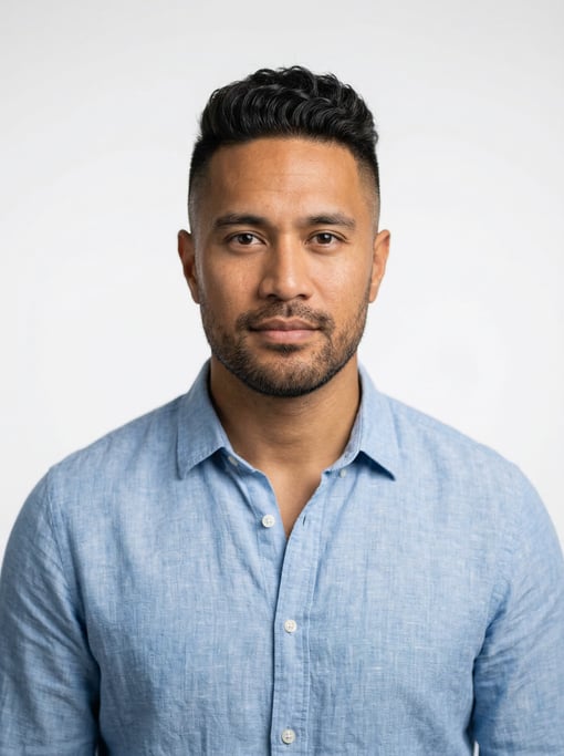 Professional studio headshot of a 30-year-old Polynesian man with an undercut with longer textured t