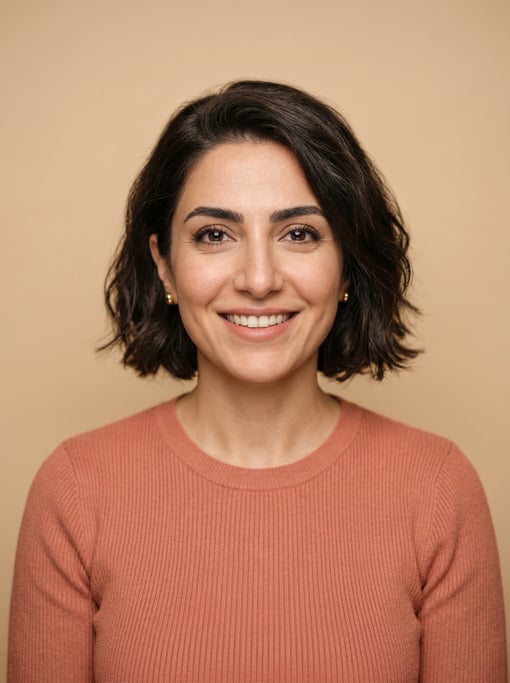 Professional studio headshot of a 35-year-old Persian woman with a chin-length bob in dark brown