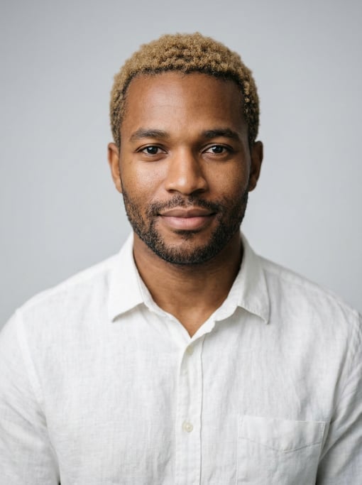 Professional studio headshot of a 26-year-old Black African man with short dirty blonde hair